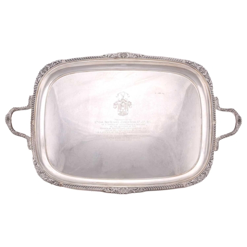 522 - A silver twin handled tea tray, by the Goldsmiths and Silversmiths Company, London 1932, rounded rec... 