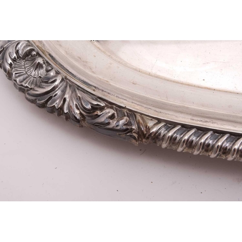 522 - A silver twin handled tea tray, by the Goldsmiths and Silversmiths Company, London 1932, rounded rec... 