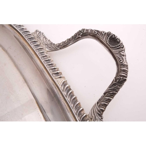 522 - A silver twin handled tea tray, by the Goldsmiths and Silversmiths Company, London 1932, rounded rec... 