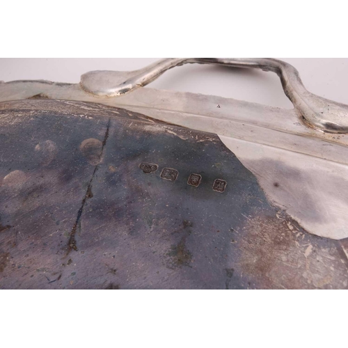 522 - A silver twin handled tea tray, by the Goldsmiths and Silversmiths Company, London 1932, rounded rec... 
