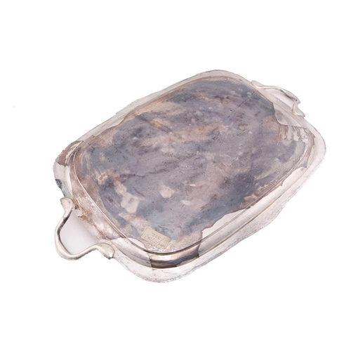 522 - A silver twin handled tea tray, by the Goldsmiths and Silversmiths Company, London 1932, rounded rec... 