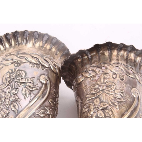 526 - A silver half-reeded sugar basin engraved with a dedication, 6.4ozt together with two weighted silve... 