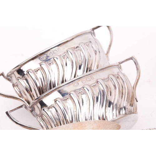527 - A mixed collection of silver cruets, including a pair of mustard pots by William Hutton and Sons Ltd... 