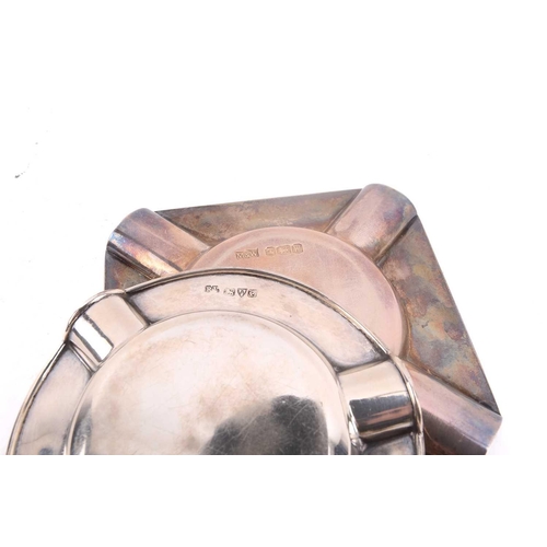 528 - A collection of silver smoking related items, comprising a square ashtray with engine turned decorat... 