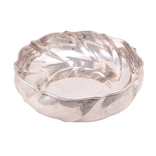 533 - An Italian white metal bowl of circular spirally lobed form, 36cm diameter, stamped Callegar Padova,... 