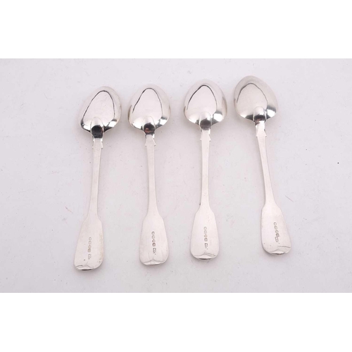 537 - A set of four William IV silver fiddle pattern serving spoons, each engraved with the initials M.D.T... 