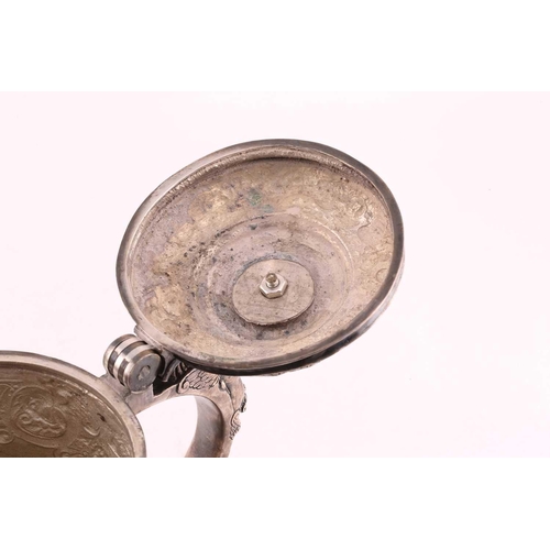 542 - A Hungarian electroplated lidded tankard. Tapering cylindrical with reeded skirt foot; the body with... 
