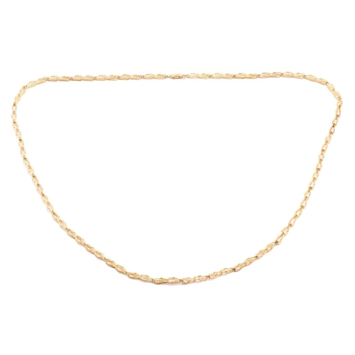 6 - A Modernism fancy link necklace in 18ct yellow gold, composed of textured links with bead details, c... 