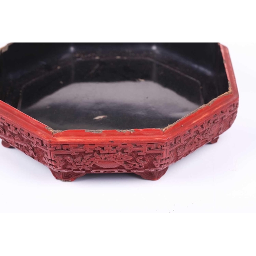 110 - A Cinnabar lacquer peach shape box, the lid depicting an immortal riding through a landscape, with g... 