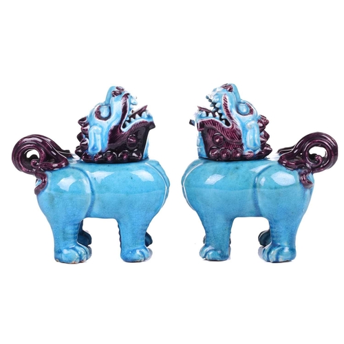 112 - A pair of Chinese standing lion dogs, with removable heads and open mouths, in turquoise and aubergi... 