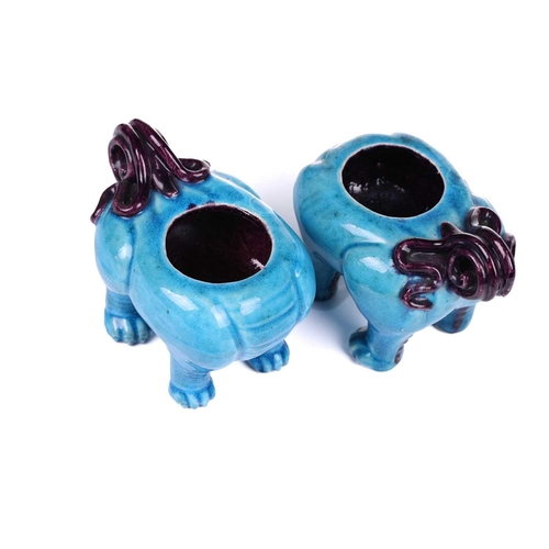 112 - A pair of Chinese standing lion dogs, with removable heads and open mouths, in turquoise and aubergi... 