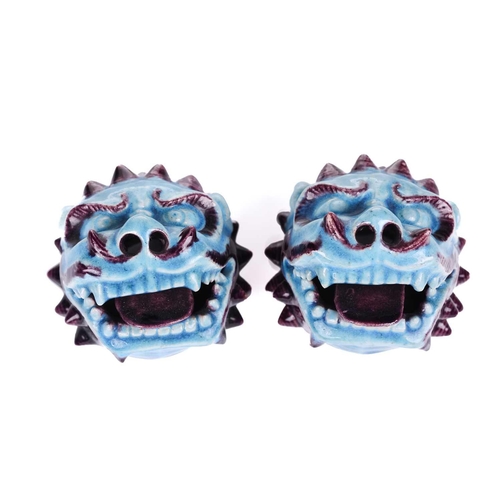 112 - A pair of Chinese standing lion dogs, with removable heads and open mouths, in turquoise and aubergi... 