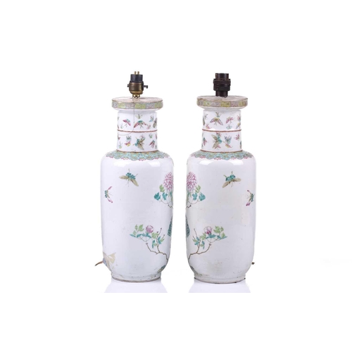 114 - A pair of Chinese Famile Rose porcelain rouleau vases, now as table lamps, late Qing Dynasty, painte... 