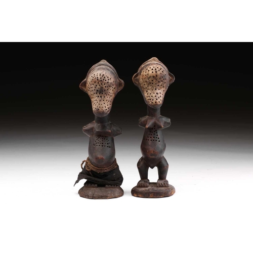 133 - An unusual pair of Janiform female power figures, possibly Songye, Democratic Republic of Congo, bis... 