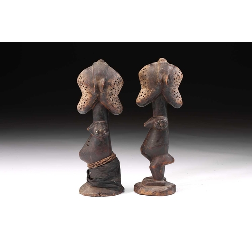 133 - An unusual pair of Janiform female power figures, possibly Songye, Democratic Republic of Congo, bis... 