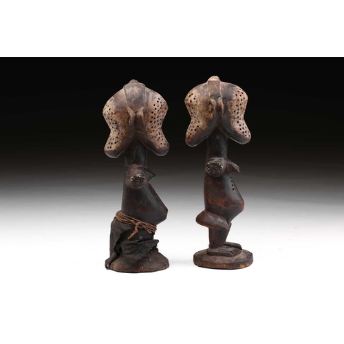 133 - An unusual pair of Janiform female power figures, possibly Songye, Democratic Republic of Congo, bis... 