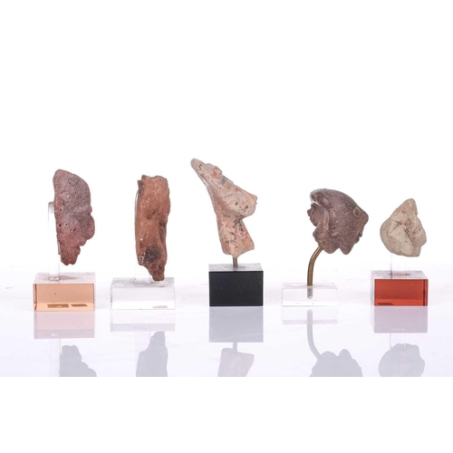 137 - A small collection Pre Columbian and possibly Majapahit terra cotta figural fragments with signs of ... 