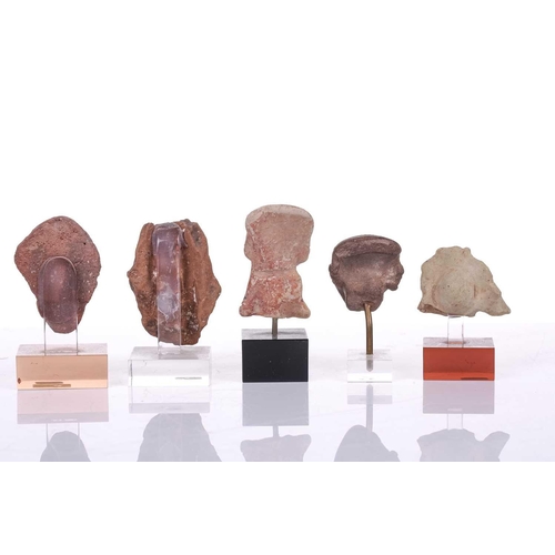 137 - A small collection Pre Columbian and possibly Majapahit terra cotta figural fragments with signs of ... 