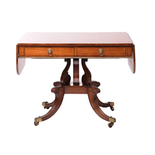 145 - A possibly Scottish George IV rosewood crossbanded mahogany sofa table fitted with two deep frieze d... 