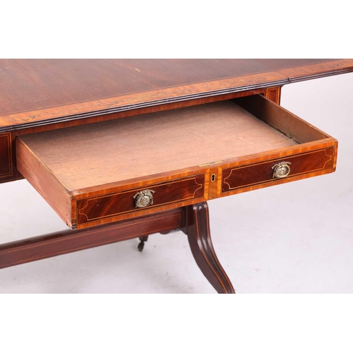 155 - A Sheraton period satinwood crossbanded mahogany sofa table, the top inlaid with running bands of fl... 