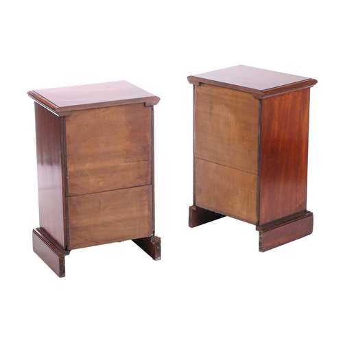 157 - A pair of Victorian mahogany bedside drawers, each with moulded edge top above three graduated drawe... 