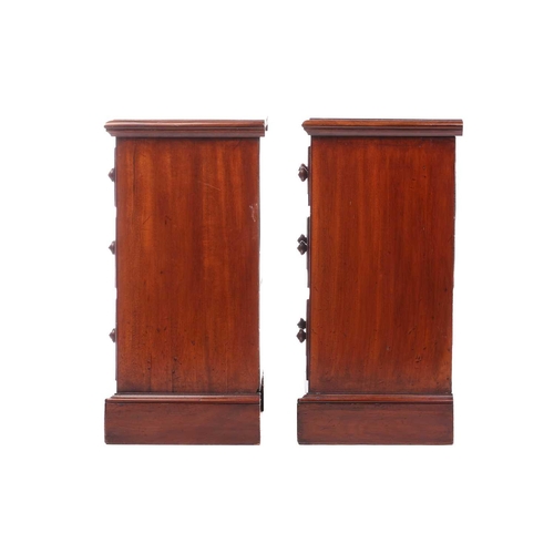 157 - A pair of Victorian mahogany bedside drawers, each with moulded edge top above three graduated drawe... 