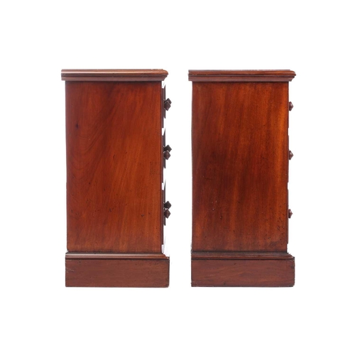 157 - A pair of Victorian mahogany bedside drawers, each with moulded edge top above three graduated drawe... 