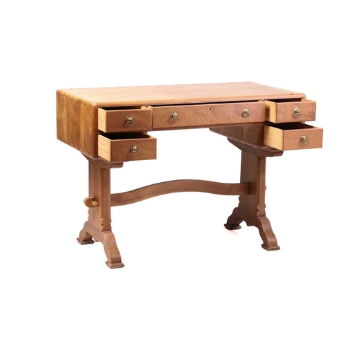 158 - A walnut writing table, probably of the workshops of Arthur Romney Green, C.1925 the five drawers wi... 