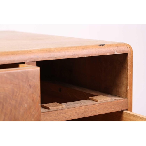 158 - A walnut writing table, probably of the workshops of Arthur Romney Green, C.1925 the five drawers wi... 