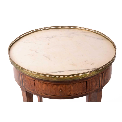 168 - A French Louis XVI style marble-topped circular Bouillotte table, 19th century and later, with a pai... 