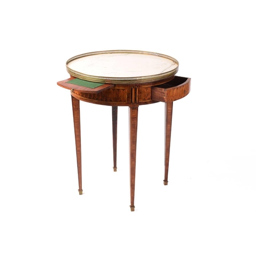 168 - A French Louis XVI style marble-topped circular Bouillotte table, 19th century and later, with a pai... 