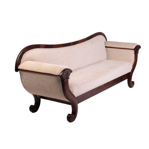 172 - A French Empire early figured mahogany scroll end sofa, the arms carved as a stylized cornucopia and... 