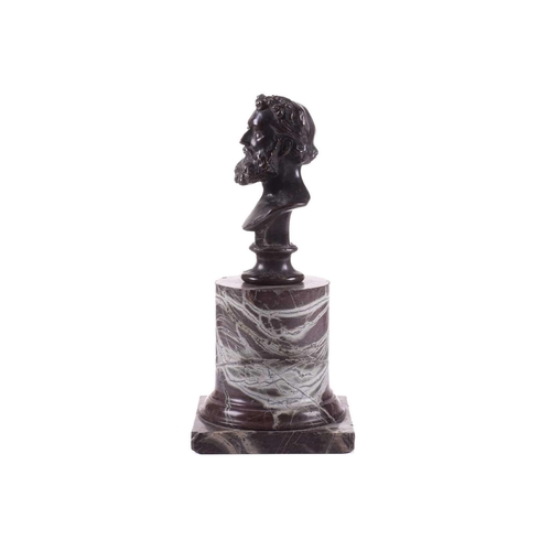 183 - A bronze bust of Lord Frederick Leighton (1830-1896), on an associated red marble cylindrical column... 