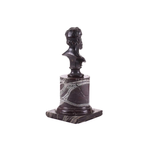 183 - A bronze bust of Lord Frederick Leighton (1830-1896), on an associated red marble cylindrical column... 