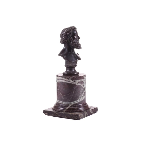 183 - A bronze bust of Lord Frederick Leighton (1830-1896), on an associated red marble cylindrical column... 