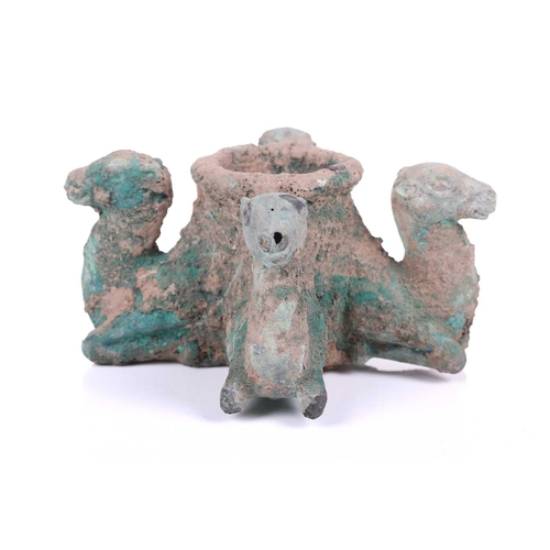 184 - A Persian bronze vessel in the form of camels, 16cm wide An old and established private collection