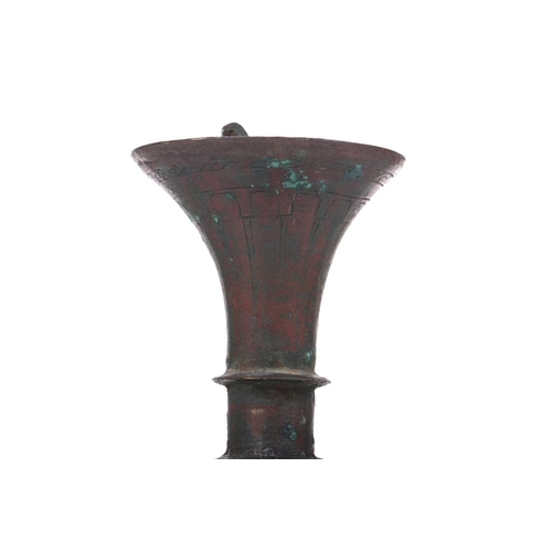 185 - An bronze incense burner, in the Ottoman style, probably 20th century, the ribbed body below a taper... 