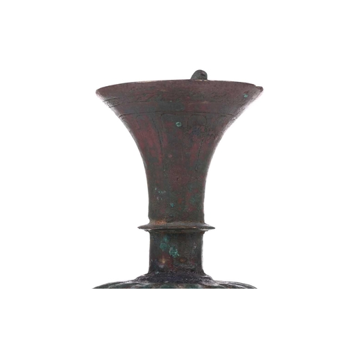 185 - An bronze incense burner, in the Ottoman style, probably 20th century, the ribbed body below a taper... 