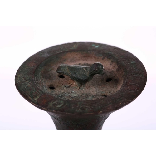 185 - An bronze incense burner, in the Ottoman style, probably 20th century, the ribbed body below a taper... 