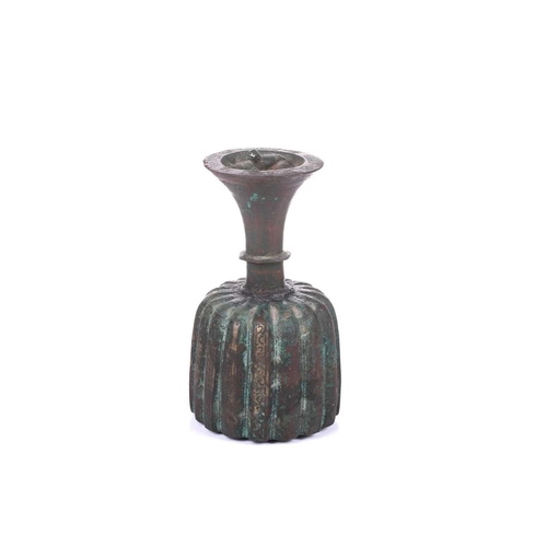 185 - An bronze incense burner, in the Ottoman style, probably 20th century, the ribbed body below a taper... 