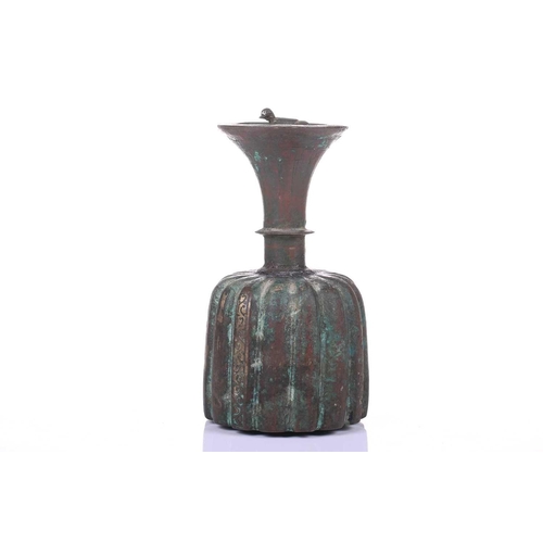 185 - An bronze incense burner, in the Ottoman style, probably 20th century, the ribbed body below a taper... 