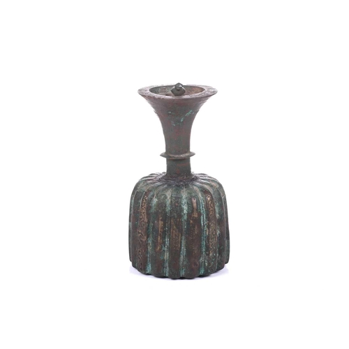 185 - An bronze incense burner, in the Ottoman style, probably 20th century, the ribbed body below a taper... 