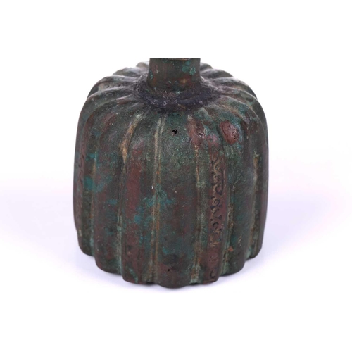 185 - An bronze incense burner, in the Ottoman style, probably 20th century, the ribbed body below a taper... 