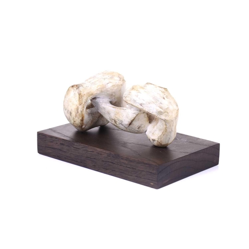 188 - Manner of Henry Moore (1898-1986), reclining figure, a plaster maquette on a wooden plinth, 11 cm hi... 