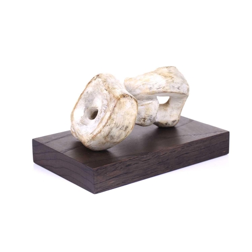 188 - Manner of Henry Moore (1898-1986), reclining figure, a plaster maquette on a wooden plinth, 11 cm hi... 