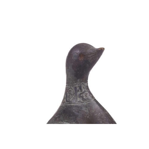 190 - A Khorasan style bronze bird, Persia, possibly 11th/12th century, the bulbous body, with scaled carv... 