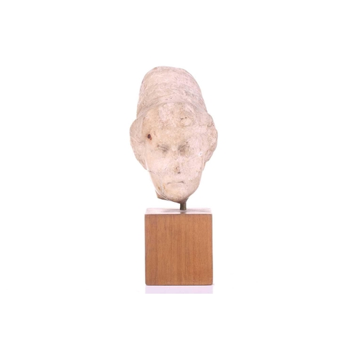 197 - A Marble head of a female, Roman 2nd cenutry and later, depicted in traditional form, with later car... 