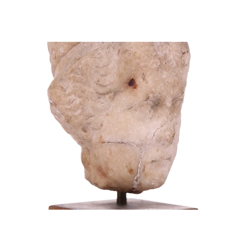 197 - A Marble head of a female, Roman 2nd cenutry and later, depicted in traditional form, with later car... 