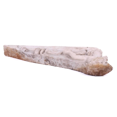 201 - A Roman Marble fragment, 2nd/3rd century AD, possibly part of a sarcophagus, depicitng a youth in ro... 