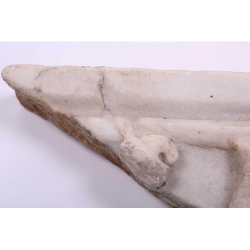 201 - A Roman Marble fragment, 2nd/3rd century AD, possibly part of a sarcophagus, depicitng a youth in ro... 